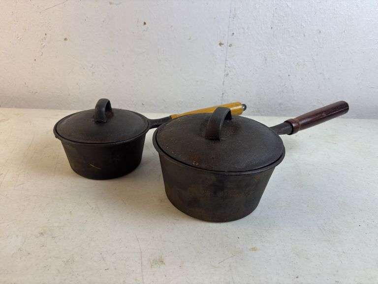 2 Cast Iron Pots w/Lids