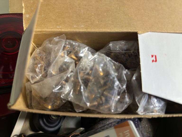 ASSORTMENT BOX WITH TAIL/BRAKE LIGHT, WIRING, GLASS SQUEEGEES, CASTERS, RADIO ANTENNA AND MORE