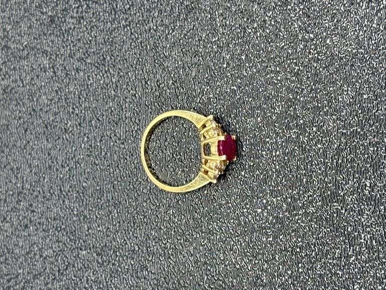 RUBY AND DIAMOND 14K GOLD RING @ 4 GRAMS