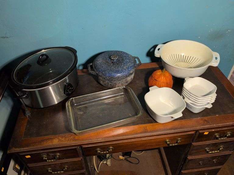 Brentwood crock pot, Corning Ware, L.L. Bean cast iron pot, and Pyrex baking pan