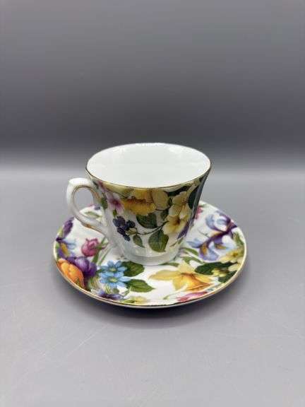BAUM BROS 4 PC TEACUP AND SAUCER SET