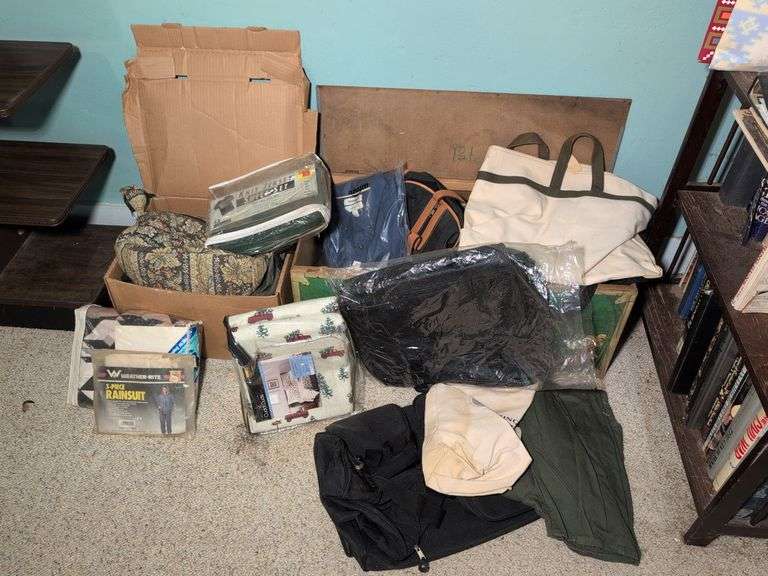 Rainsuits, duffel bags, and other bags