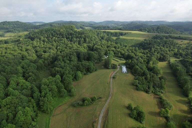 41.97 +/- acres surface with 79.85 +/- acres oil and gas rights, modern farmhouse