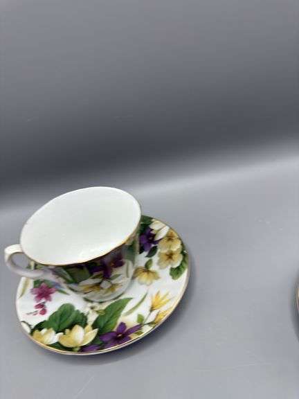 BAUM BROS 4 PC TEACUP AND SAUCER SET
