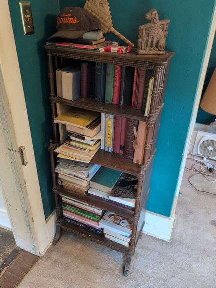 Bookshelf with contents - books, book ends and more