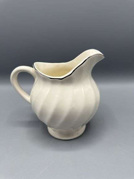VARIETY OF PITCHERS, VASES, AND SUGAR BOWL