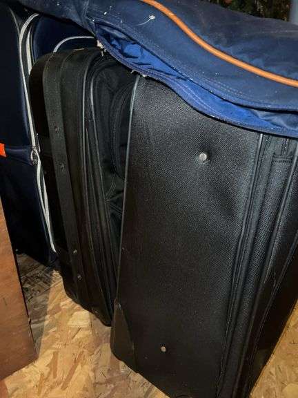 Suit Cases, Duffel Bag and Wardrobe Bag