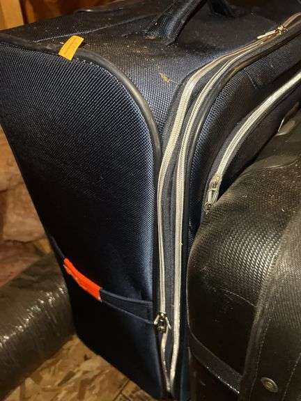 Suit Cases, Duffel Bag and Wardrobe Bag