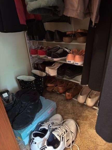 CONTENTS OF CLOSET WOMEN’S COATS AND JACKETS (SOME NEW WITH TAGS) ALOT OF SIZE L AND XL. SHOES SIZE