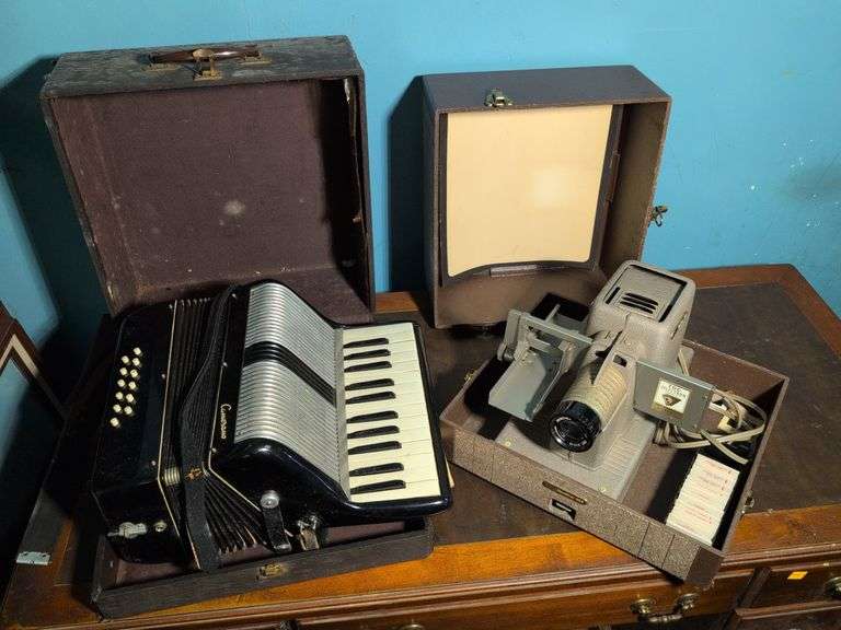 Antique Camerano accordion and Headliner 303 projector