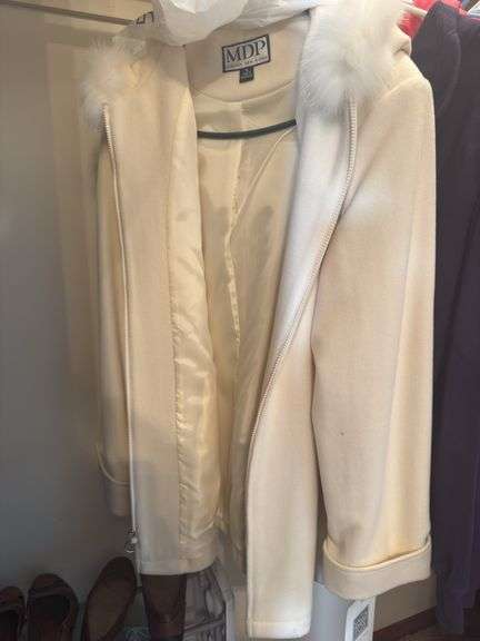 CONTENTS OF CLOSET WOMEN’S COATS AND JACKETS (SOME NEW WITH TAGS) ALOT OF SIZE L AND XL. SHOES SIZE