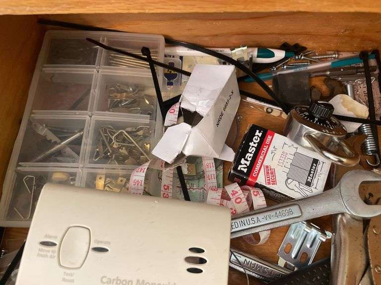 Contents of 2 drawers - tools, tape, batteries, and more