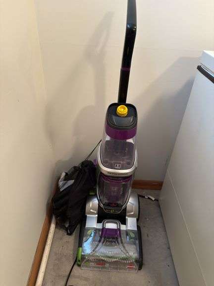 BISSELL REVOLUTION PET PRO LIKE NEW WITH ACCESSORIES AND CLEANING AGENTS