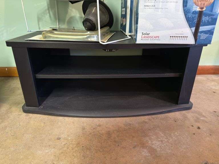 TV STAND/CONSOLE WITH ALL CONTENTS PICTURED, INCLUDING OSU GARDEN FLAG, OX OF SOLAR LIGHTS, GARDEN