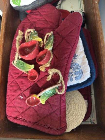 CONTENTS OF DRAWER OVEN MITTS, MEASURING SPOONS