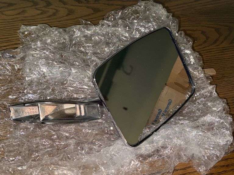 PAIR OF JUMPER CABLES, MOTOR OIL, AND GM SIDE MIRROR (SEE SERIAL CODE)
