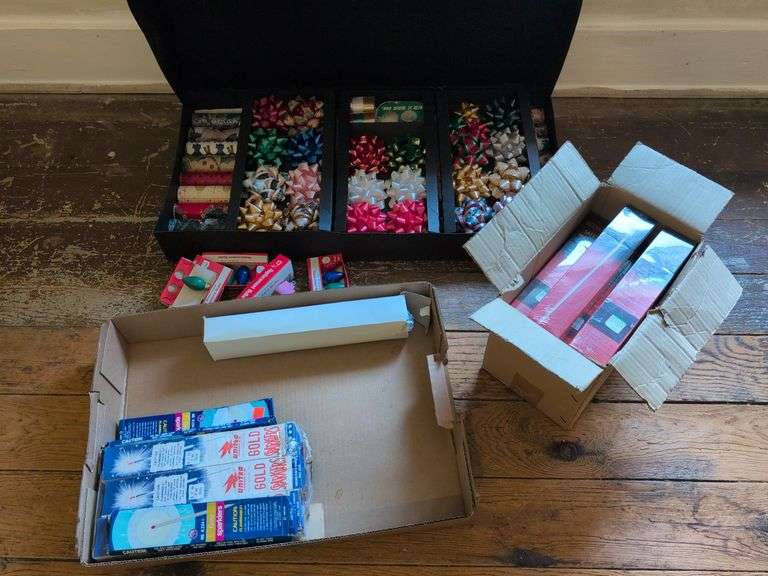 Christmas ribbon and wrapping paper, and safety matches and sparklers