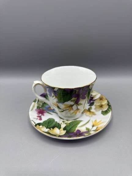 BAUM BROS 4 PC TEACUP AND SAUCER SET