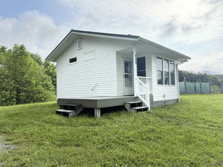 41.97 +/- acres surface with 79.85 +/- acres oil and gas rights, modern farmhouse