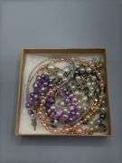 ASSORTMENT OF JEWELRY BRACELETS, NECKLACES, EARRINGS, BROOCHES