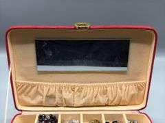 RED SUEDE JEWELRY BOX WITH CONTENTS OF EARRINGS, BRACELTS, BEADED NECKLACES