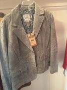 CONTENTS OF CLOSET WOMEN’S COATS AND JACKETS (SOME NEW WITH TAGS) ALOT OF SIZE L AND XL. SHOES SIZE 