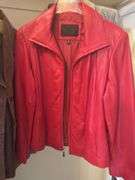 CONTENTS OF CLOSET WOMEN’S COATS AND JACKETS (SOME NEW WITH TAGS) ALOT OF SIZE L AND XL. SHOES SIZE 