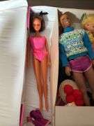 VINTAGE “THE WORLD OF BARBIE” DOLL CASE AND FASHION DOLL CASE WITH DOLLS AND CLOTHES
