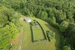 41.97 +/- acres surface with 79.85 +/- acres oil and gas rights, modern farmhouse