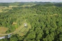 41.97 +/- acres surface with 79.85 +/- acres oil and gas rights, modern farmhouse