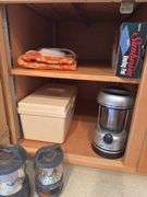 CONTENTS OF CABINETS, SHEETS, LIGHTBULBS, AIR FRESHENERS AND PLUG-INS, BATTERY POWERED LANTERNS, SEW