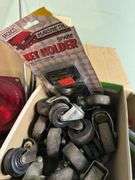 ASSORTMENT BOX WITH TAIL/BRAKE LIGHT, WIRING, GLASS SQUEEGEES, CASTERS, RADIO ANTENNA AND MORE
