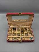 RED SUEDE JEWELRY BOX WITH CONTENTS OF EARRINGS, BRACELTS, BEADED NECKLACES