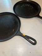 (2) 10” Lodge Cast Iron Skillets