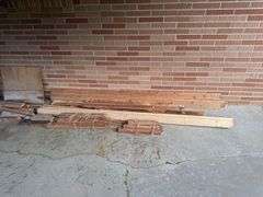 STACK OF MISC. LUMBER WITH 2x4’s , 1x4’s, AND MORE