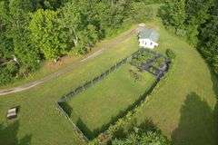 41.97 +/- acres surface with 79.85 +/- acres oil and gas rights, modern farmhouse
