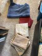 Storage bench and tote with curtains, sheets, and more