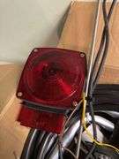 ASSORTMENT BOX WITH TAIL/BRAKE LIGHT, WIRING, GLASS SQUEEGEES, CASTERS, RADIO ANTENNA AND MORE