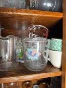 CONTENTS OF CABINET MEASURING CUPS, JARS, VASES