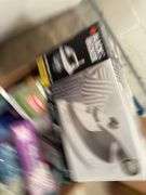 BLACK & DECKER QUICK-PRESS IRON AND BOX OF CLEANING SUPPLIES