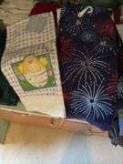 CONTENTS OF COUNTER TOP, TEA TOWELS (SOME NEW), CANDLES,