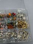 VARIETY OF EARRINGS, NECKLACES, AND PENDANTS