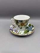 BAUM BROS 4 PC TEACUP AND SAUCER SET
