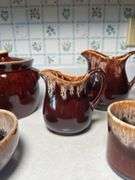 BROWN  POTTERY BEAN POT AND BOWL, PAIR OF SMALL PITCHERS, CUP