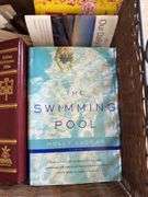 PAIR OF METAL FRAME WICKER BOX WITH VARIETY OF BOOKS