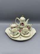 MINIATURE CHINA TEA SETS