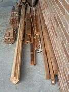STACK OF MISC. LUMBER WITH 2x4’s , 1x4’s, AND MORE