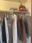 CONTENTS OF CLOSET WOMEN’S COATS AND JACKETS (SOME NEW WITH TAGS) ALOT OF SIZE L AND XL. SHOES SIZE 