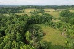 41.97 +/- acres surface with 79.85 +/- acres oil and gas rights, modern farmhouse