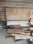 STACK OF MISC. LUMBER WITH 2x4’s , 1x4’s, AND MORE